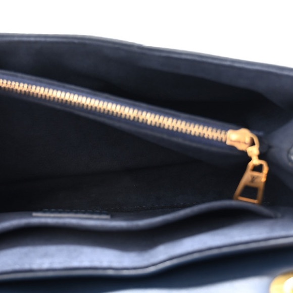 Louis Vuitton wave bag in excellent condition. - Picture 11 of 11